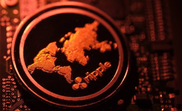 Ripple Vs. SWIFT Battle Heats Up With ‘Fax Machine Vs. Web’ Remark Fanning The Flames