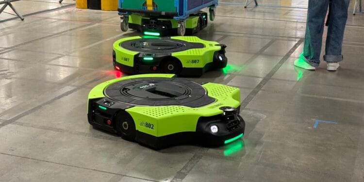 Amazon unveils newest warehouse robotic as tech giants do AI layoffs